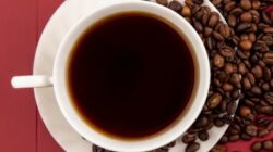 cafe-bari-top-view-cup-coffee-with-coffee-beans-and-cup-bari