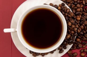 cafe-bari-top-view-cup-coffee-with-coffee-beans-and-cup-bari